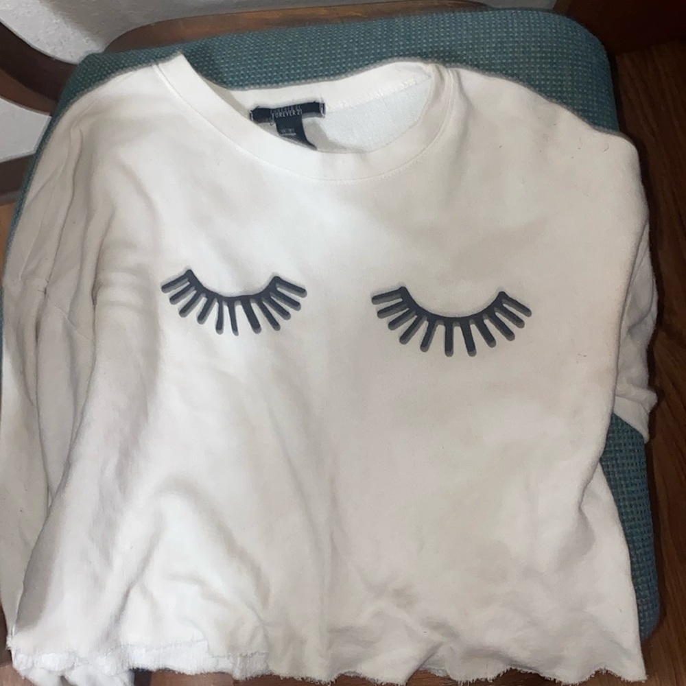 White long sleeve shirt with eye lashes